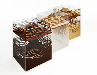 Illustration for article titled Topographic Tables Mix Geology With Interior Design